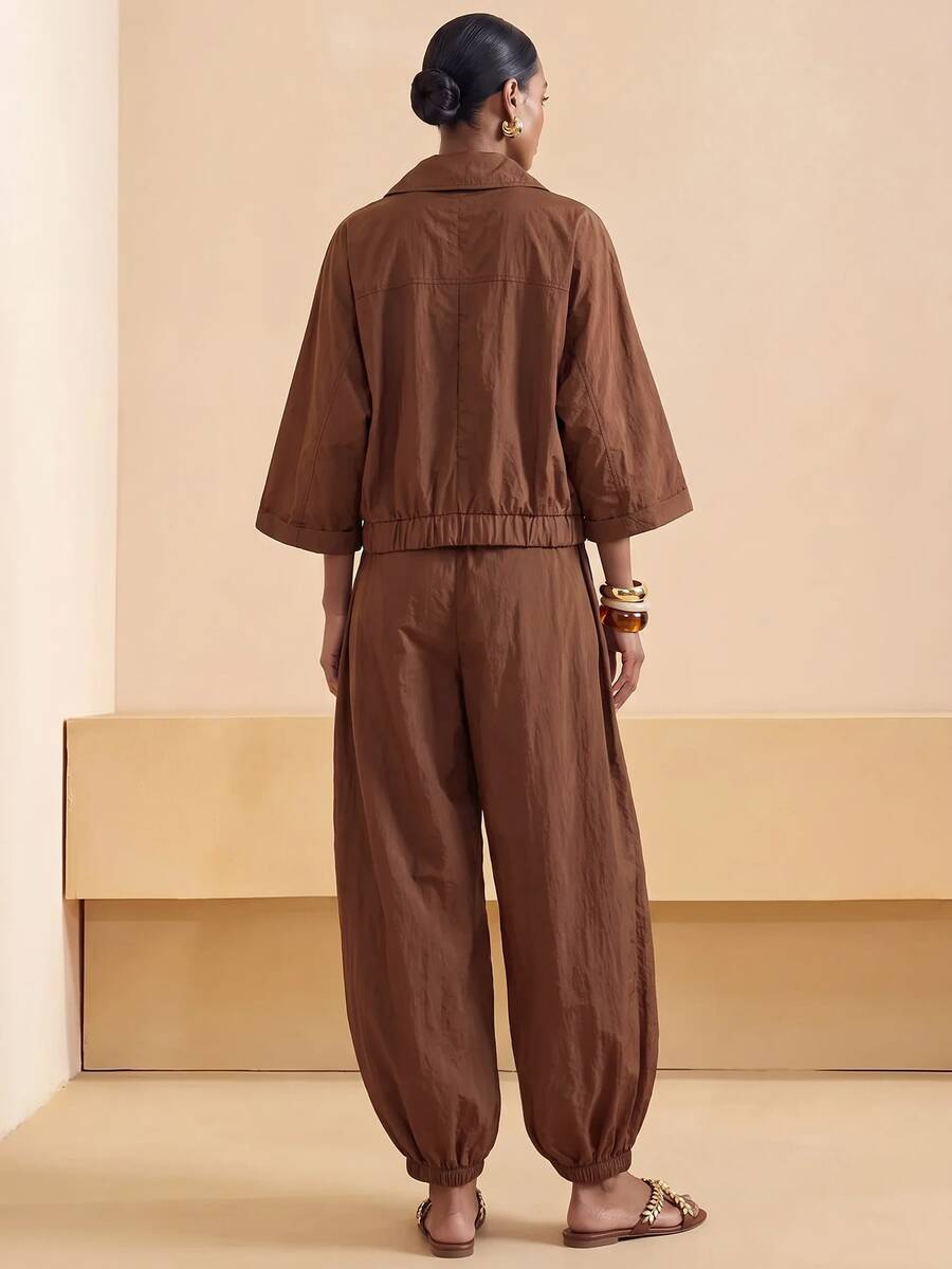 Collared Button Front Tapered Leg Jumpsuit