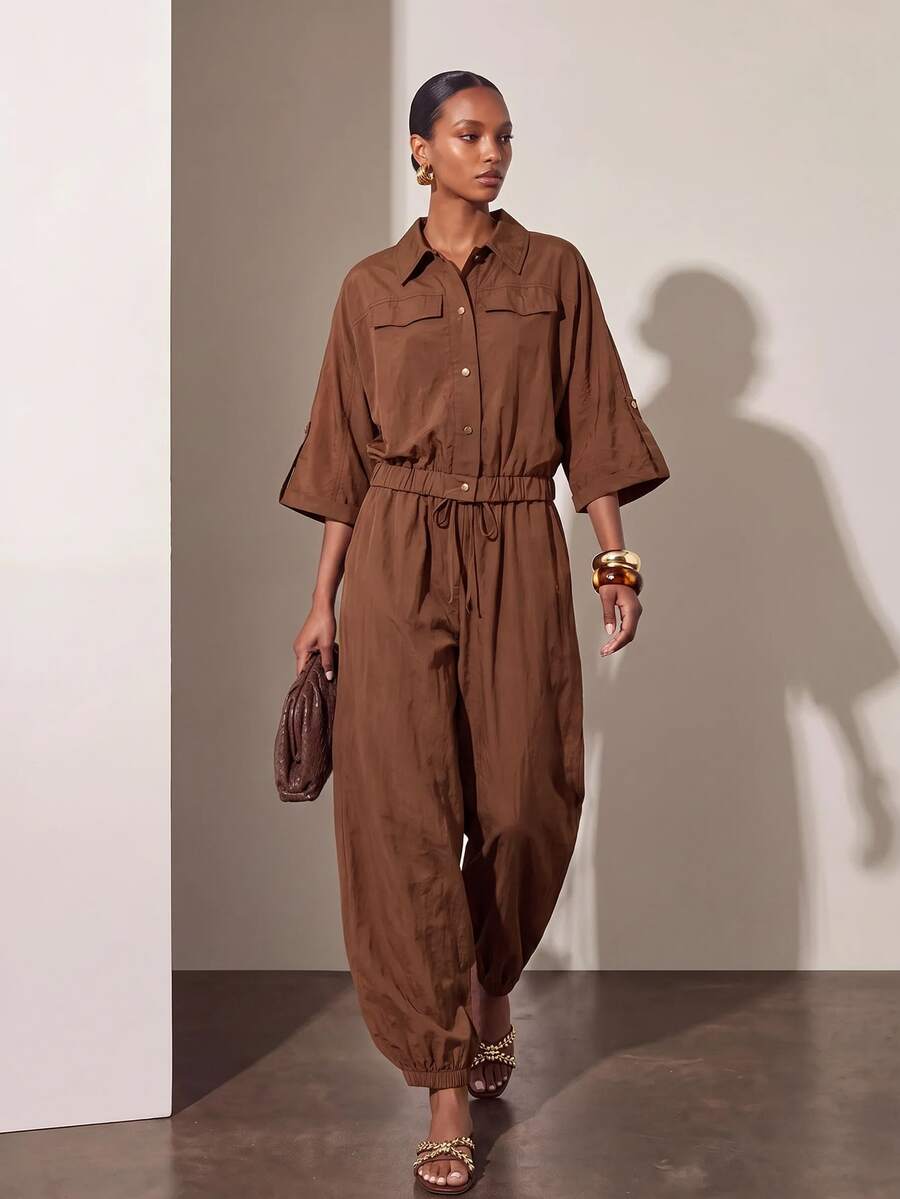 Collared Button Front Tapered Leg Jumpsuit